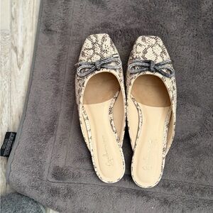 Chic Snake Print Mules with Bow by [Brand]